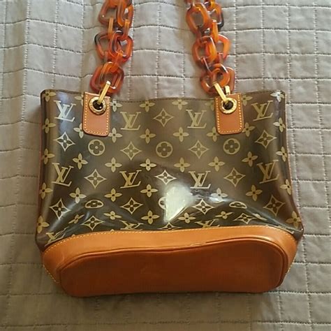 louis vuitton monogram clutch wallet|Louis Vuitton clear monogram bag.